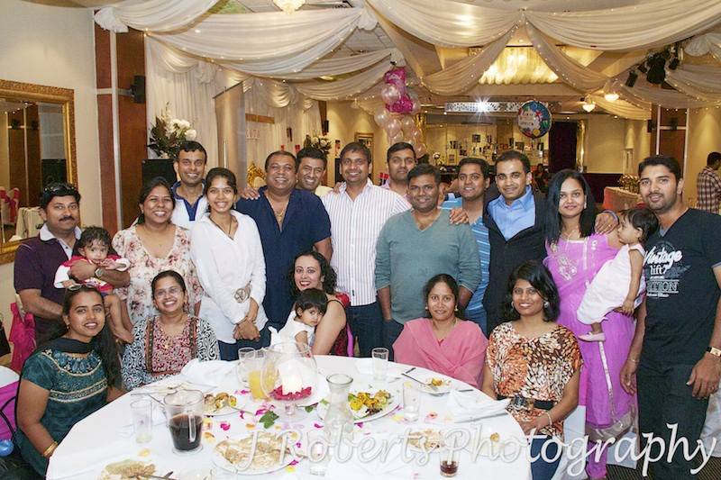 Big group celebrating indian girls first birthday party - party photography sydney